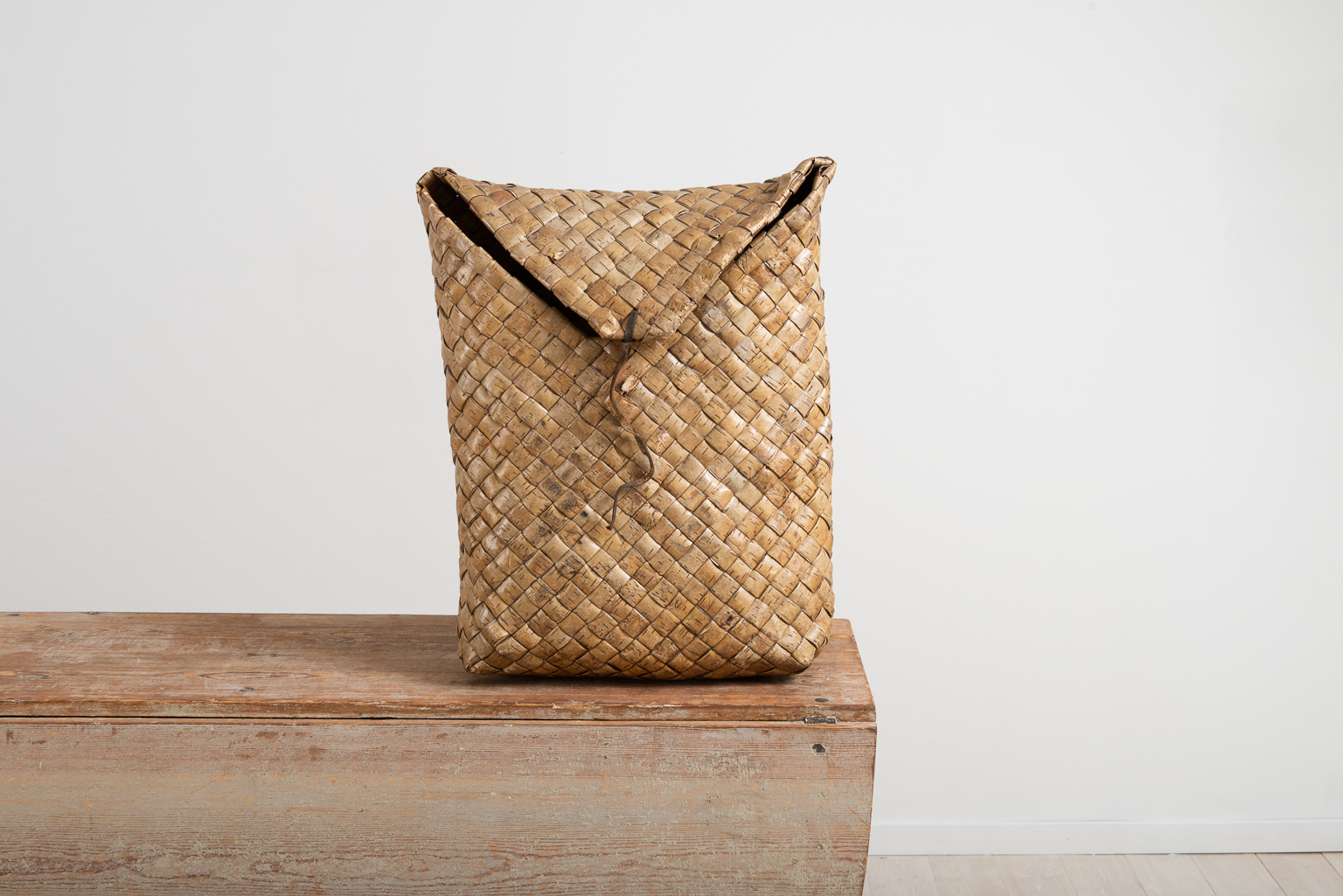 Early rucksack in birch bark. The folk art rucksack is an early Swedish version of a backpack, in Swedish called 'kont'. Manufactured during the mid 19th century
