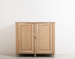Neoclassic sideboard from northern Sweden. The sideboard has its original distressed paint. It is richly decorated with carved wooden decorations.