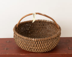 Folk art woven basket from the late 19th century. The basket has some minor signs of wear but is otherwise in good antique condition. For more Miscellaneous