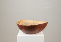 Birch root bowl in untouched original condition. The wooden bowl is an organic shape and marked underneath with a house mark from the first owner