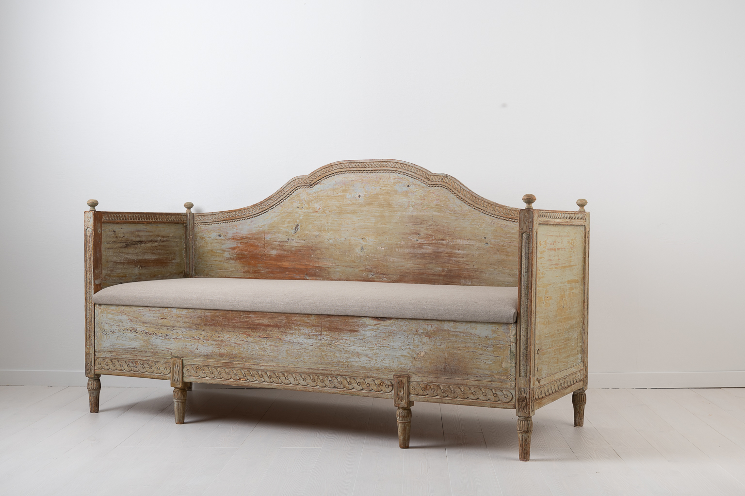 Gustavian bench from the 18th century. The bench or sofa is Swedish gustavian which corresponds to the more international neoclassical period