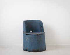 Primitive and rustic Kubbstol from Sweden. A kubbstol is a primitive chair made of a single large piece of wood. This pine log is hollowed out