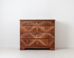 Swedish folk art chest of drawers from the mid 1800s. The chest is pine with decorative painting. Distressed paint after 200 years of genuine use
