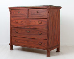 Northern Swedish commode from the transition time between the gustavian and empire period. The chest has three large drawers and two small ones