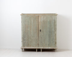 Pale green gustavian sideboard from Northern Sweden. The sideboard is from the late 1700s and made in Swedish pine. Dry scraped by hand to the original pale green paint