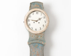 Northern Swedish Mora clock in rococo style with painted pine case made around 1820 to 1830. The blue paint is original from the early 1800s