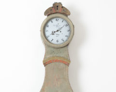 Green long case clock in the classical rococo shape. Scraped to the original first layer of paint of which the colour is a pale green.