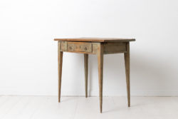 Slim gustavian side table from northern Sweden. The table is a good example of Swedish antique country furniture from 1780 to 1790
