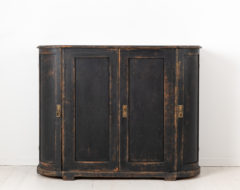 Black Swedish curved sideboard in gustavian style from the 1820s to 1840s. The sideboard has four doors, healthy and solid frame.