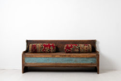 18th century country bench from Sweden. The bench, a so called fållbänk, is folk art and in untouched original condition.