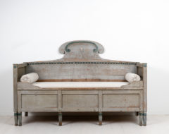Gustavian provincial grey sofa from the early 1800s, around 1820, with the original grey paint with green accents. The sofa is from the Swedish