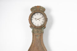 Rococo long case clock with a case in pine and dry scraped to the original first layer of paint. The clock is a so called Fryksdals clock