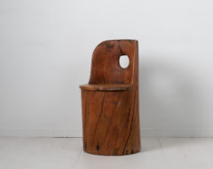 Swedish rustic Kubbstol from the turn of the century around 1900. Made in untreated pine which has gained an authentic patina
