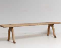 Swedish pine country bench from the early 1800s. The bench is northern Swedish with a never painted and authentic patina after 200 years of use