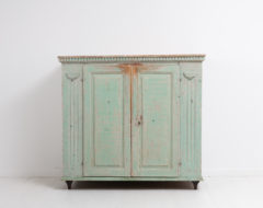 Light green gustavian sideboard from Northern Sweden made around 1790 to 1810. The sideboard is pine and dry scraped by hand to the original paint.
