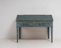 Swedish blue writing desk in painted pine. The table is in untouched original condition with the original blue toned paint. Dated 1850