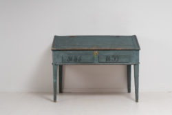 Swedish blue writing desk in painted pine. The table is in untouched original condition with the original blue toned paint. Dated 1850