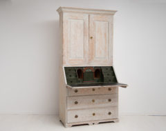 Gustavian country bureau cabinet made in pine. The cabinet is from northern Sweden and made in two parts. Scraped by hand to original paint