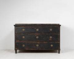 Gustavian chest of drawers from Northern Sweden made around 1790 to 1800. Made in painted pine with some wear and distress to the black paint