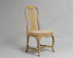 Rococo chair made in Stockholm, Sweden around 1770. The paint is from the late 1800s and has traces of use. Characterful distressed patina.