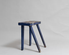 Swedish folk art stool from the late 1800s. The stool is pine with the original paint. The model / construction is slightly unusual.