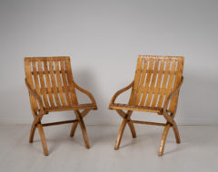 Swedish Grace armchairs from the 1930s made in birch and pine. The chairs are bare wood and has the typical characteristics of Swedish design