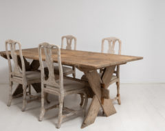 Country house trestle table from Northern Sweden. This farm table is from the early 1800s, around 1800 to 1820, and has a rustic patina