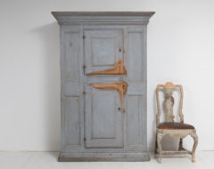 Painted redwood baroque cabinet from Sweden made during the mid 1700s. The paint is from the mid 1800s and the cabinet has wrought iron hardware
