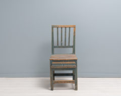 Swedish folk art chair in gustavian style from the mid 1800s. The chair is from Northern Sweden and has the original blue paint.