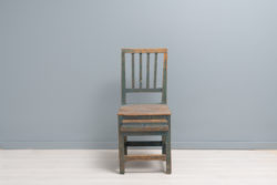 Swedish folk art chair in gustavian style from the mid 1800s. The chair is from Northern Sweden and has the original blue paint.