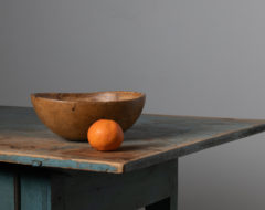 Round antique wood bowl from Northern Sweden made during the late 1800s. The bowl has higher edges and is a simple but effective way to bring antique character and easy elegance to any room. The patina is completely authentic and the wood shines with the warm patina of time. Bowls like this was used daily for storage and preparation of food so they are rare to find today. Especially in as good condition as this one.