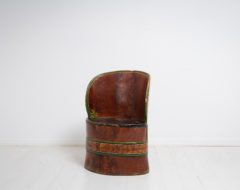 Folk art stump chair made in Sweden during the mid 1800s. The stump chair is a primitive chair made from an hollowed tree stump