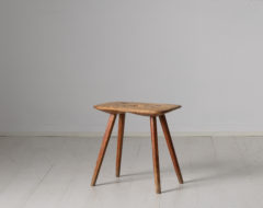 Charming folk art stool from the early 19th century. The stool is from northern Sweden and made in pine and it has the original worn patina of time