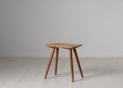 Charming folk art stool from the early 19th century. The stool is from northern Sweden and made in pine and it has the original worn patina of time