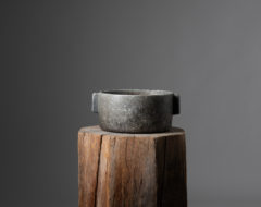 Hand-made antique pot in soapstone with handles on the sides. The pot is an unusual item today as its status was very low and many were discarded