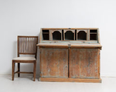 Folk art secretary desk from the early 19th century, 1810 to 1820. The secretary is a genuine northern Swedish country house furniture in pine
