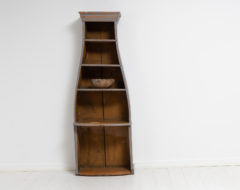 Unusual folk art shelf from the early to mid 19th century, 1820 to 1840. The shelf is from northern Sweden and primarily a floor standing shelf