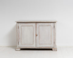 White sideboard with interior drawers from Northern Sweden. The sideboard is from around 1860 and made by hand in solid pine.