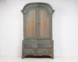 Rare rococo country cabinet in painted pine. The cabinet is a classic country house furniture from northern Sweden.
