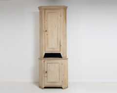 Tall gustavian corner cabinet from northern Sweden made during the late 18th century, circa 1790. The cabinet is made in two parts