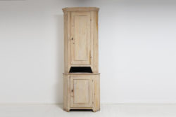 Tall gustavian corner cabinet from northern Sweden made during the late 18th century, circa 1790. The cabinet is made in two parts