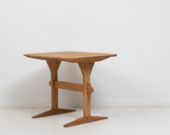 Small folk art table from northern Sweden made around 1820 to 1840. The table is made pine and has never been painted.