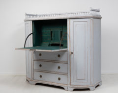 Swedish sideboard with a secretary desk made during the early 1800s, 1820 to 1830, in northern Sweden. The sideboard is a large, well-made quality furniture