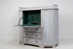 Swedish sideboard with a secretary desk made during the early 1800s, 1820 to 1830, in northern Sweden. The sideboard is a large, well-made quality furniture