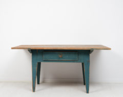 Large rustic work table from northern Sweden made during the first years of the 19th century, around 1810. The table is a country house table