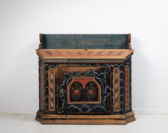 Unusual folk art sideboard from Hälsingland in Sweden made during the early 1800s, around 1820 to 1830. The sideboard is painted pine