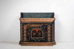 Unusual folk art sideboard from Hälsingland in Sweden made during the early 1800s, around 1820 to 1830. The sideboard is painted pine
