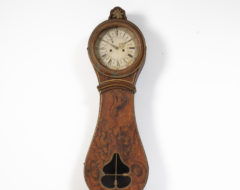 Genuine long case clock from Sweden made during the first years of the 19th century, around 1810. The clock is unusual and genuine, from the village Arbrå in Hälsingland which is located in mid Sweden. The clock is in untouched original condition and has likely been standing on the same property since it was made. There’s a picture included of the interior of the farm house in question. The clock is painted pine and was originally blue but was repainted around the mid 1800s. It was likely done after a change in generation to the current faux paint. The first blue paint shines trough in places. The clock face has unusually many details and decorations and has been left untouched since it was made. The clock comes with the original mechanism, weights and pendulum.