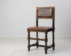 Swedish leather baroque chair from the mid 1700s. The chair has the classic angular shape with upholstery in leather. It could be the original leather