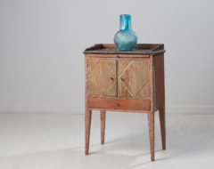 Small gustavian bureau or nightstand from Sweden made during the last years of the 18th century, 1790 to 1800. The bureau has original paint